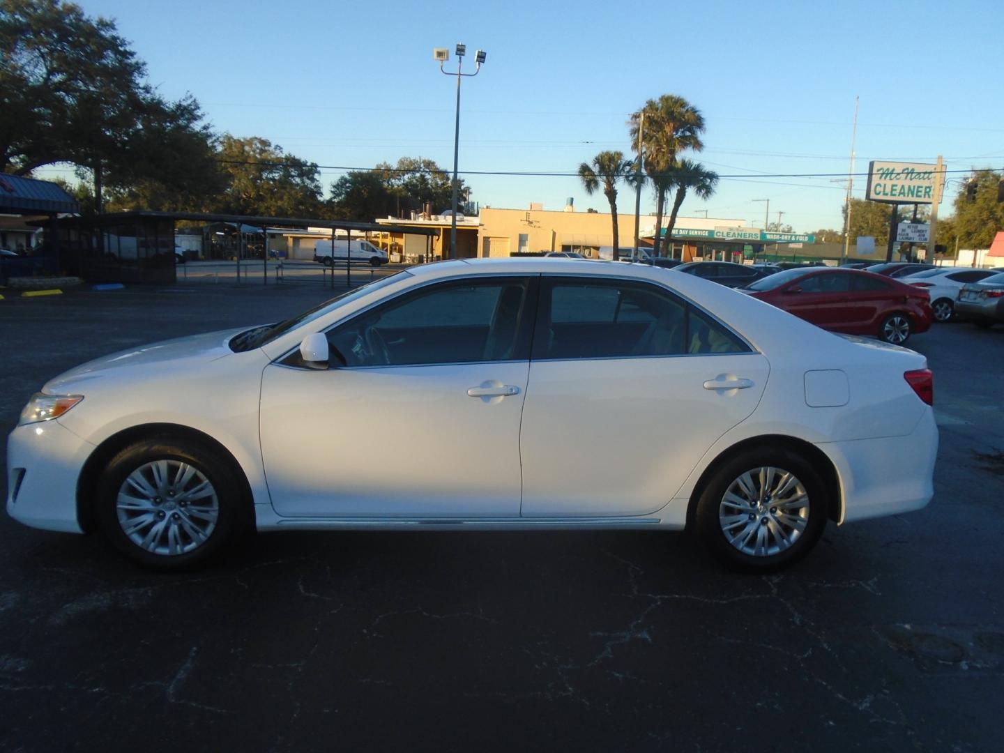 2014 Toyota Camry (4T1BF1FK0EU) , located at 6112 N Florida Avenue, Tampa, FL, 33604, (888) 521-5131, 27.954929, -82.459534 - Photo#0